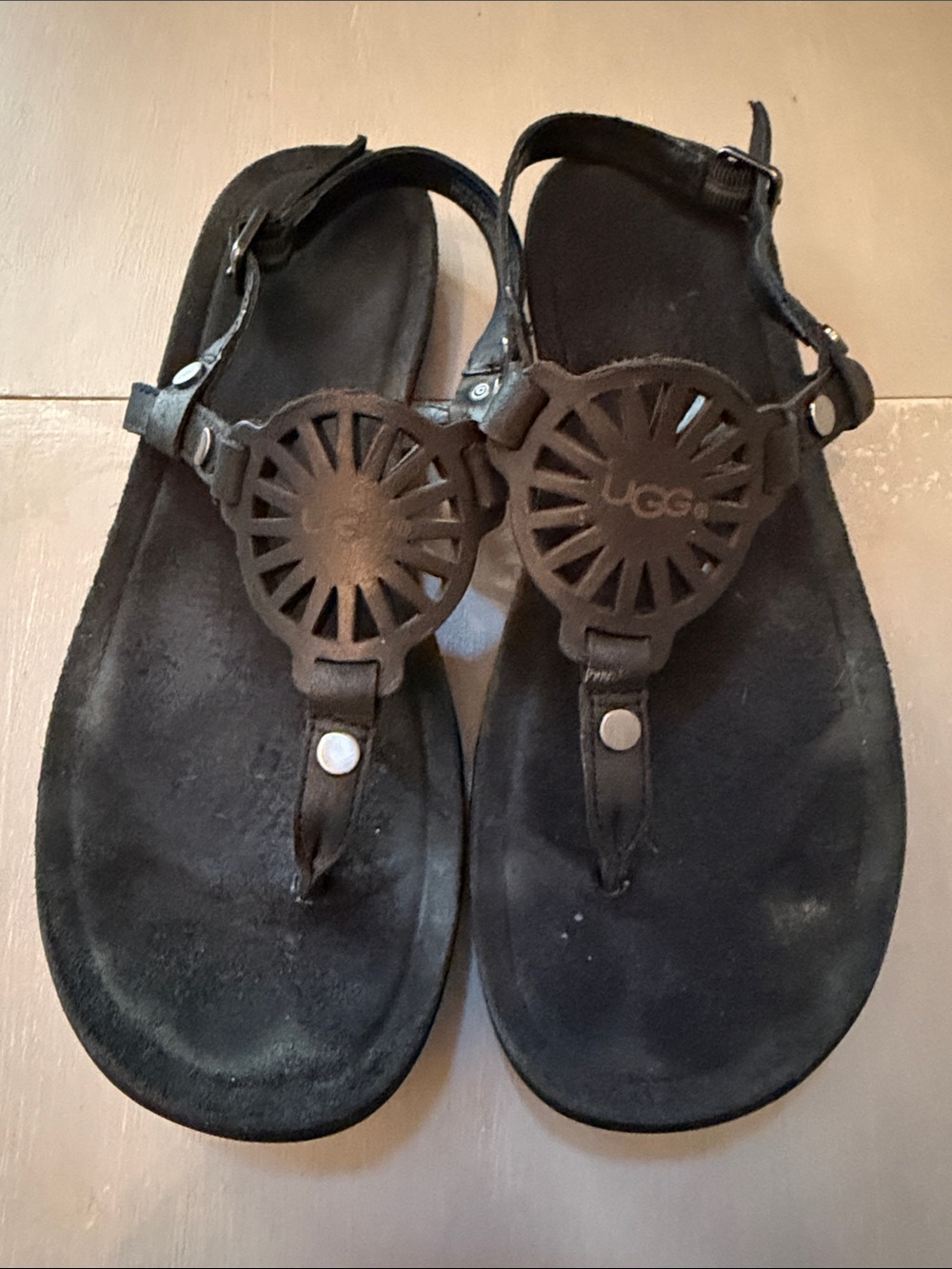 UGG Women’s Black Suede Sunburst Medallion Sandals